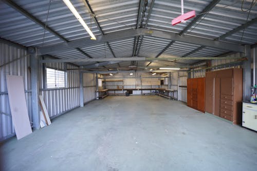 Empty Warehouse with Concrete Floor