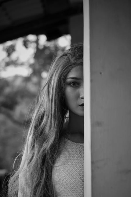 Grayscale Photo of a Woman with Long Hair