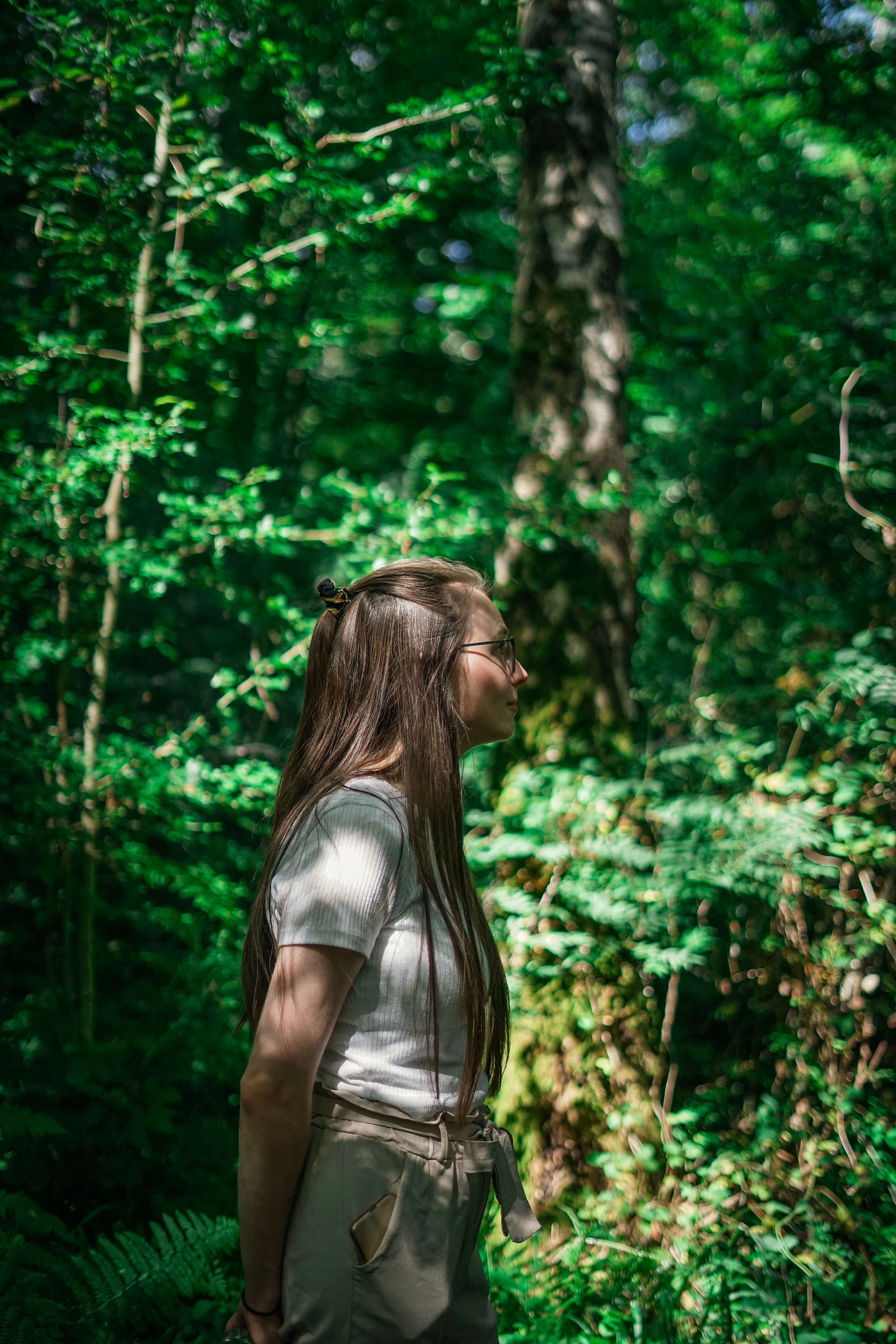 Woman Standing in the Woods · Free Stock Photo