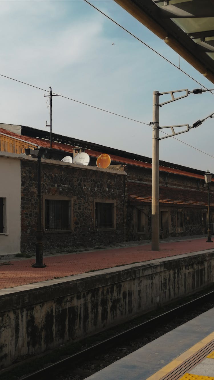 Empty Railway Platform In Perspective