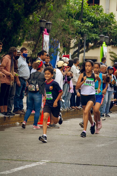 Free Running Children in a Footrace Stock Photo