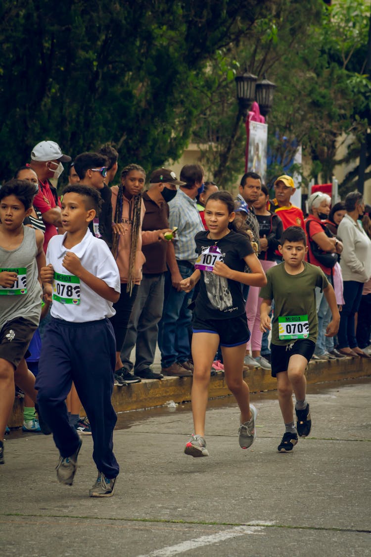 Group Of Kids Running A Marathon