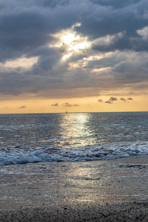 Calm Body of Water during Sunset