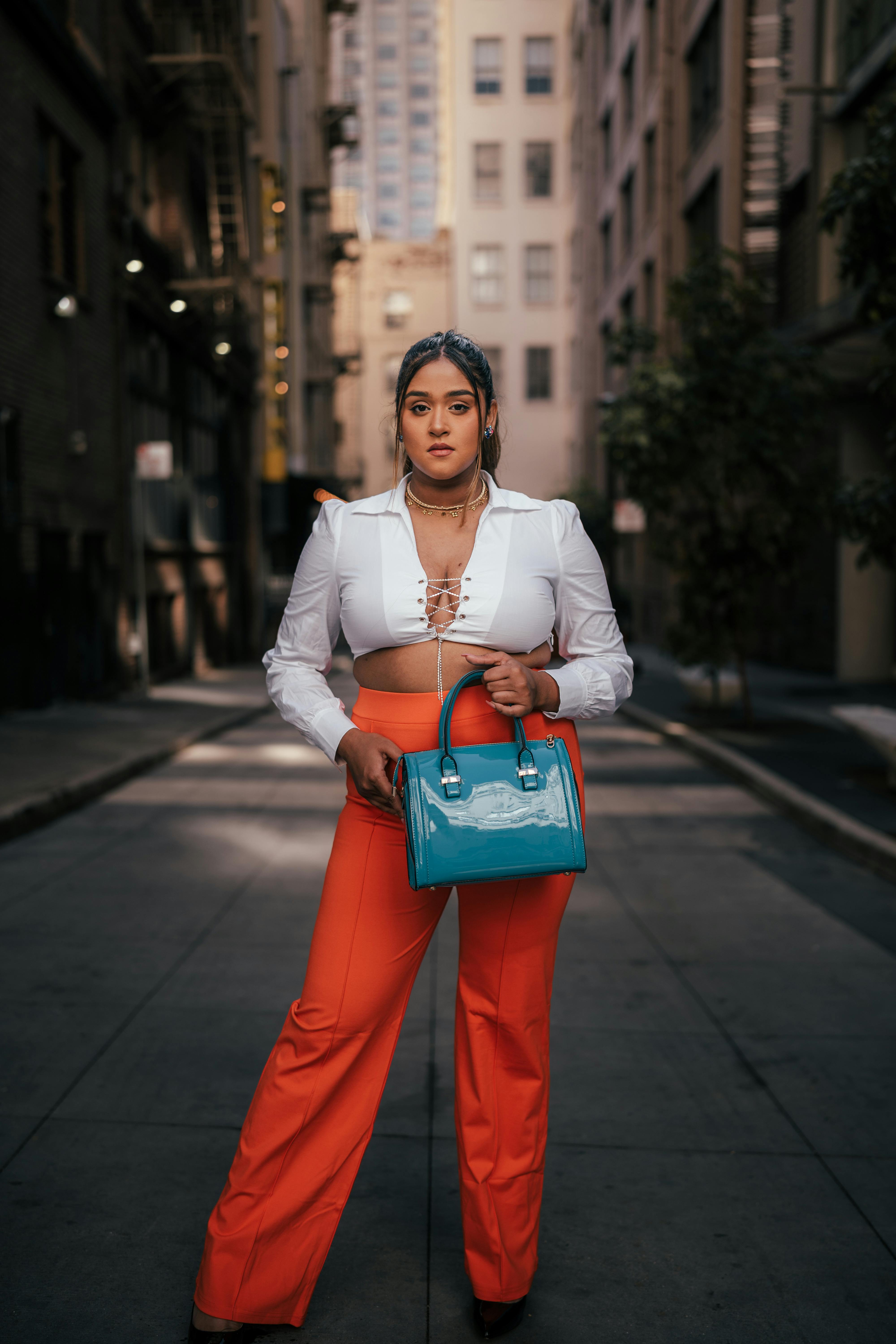 woman posing on street in city