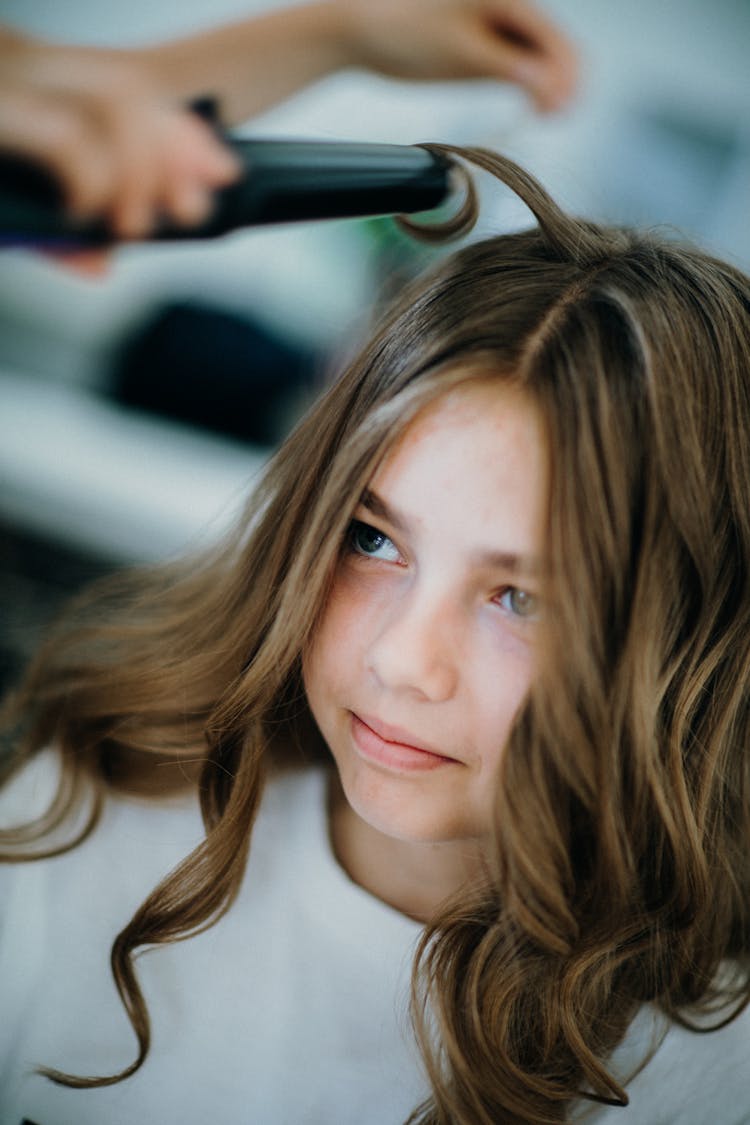 Cute Girl While Making Curls