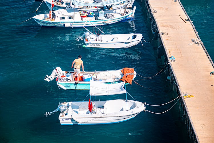 High-Angle Shot Of Boats Near Pier