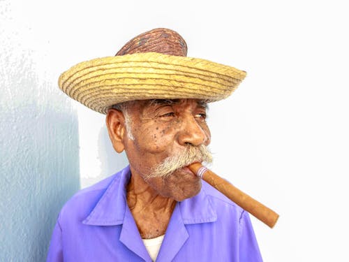Free Elderly Man with a Cigar on Mouth Stock Photo