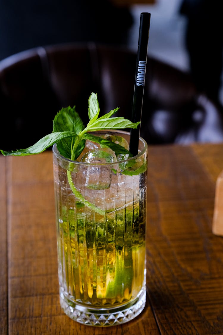 Cocktail With Mint And Lime In Glass