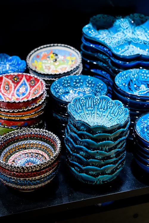 Piles of Blue and Colorful Ceramic Bowls