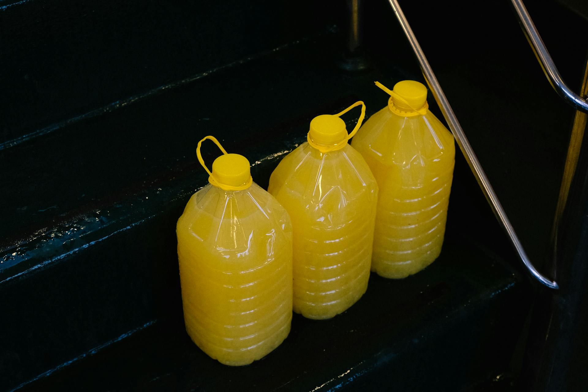 Yellow Liquid in Plastic Containers