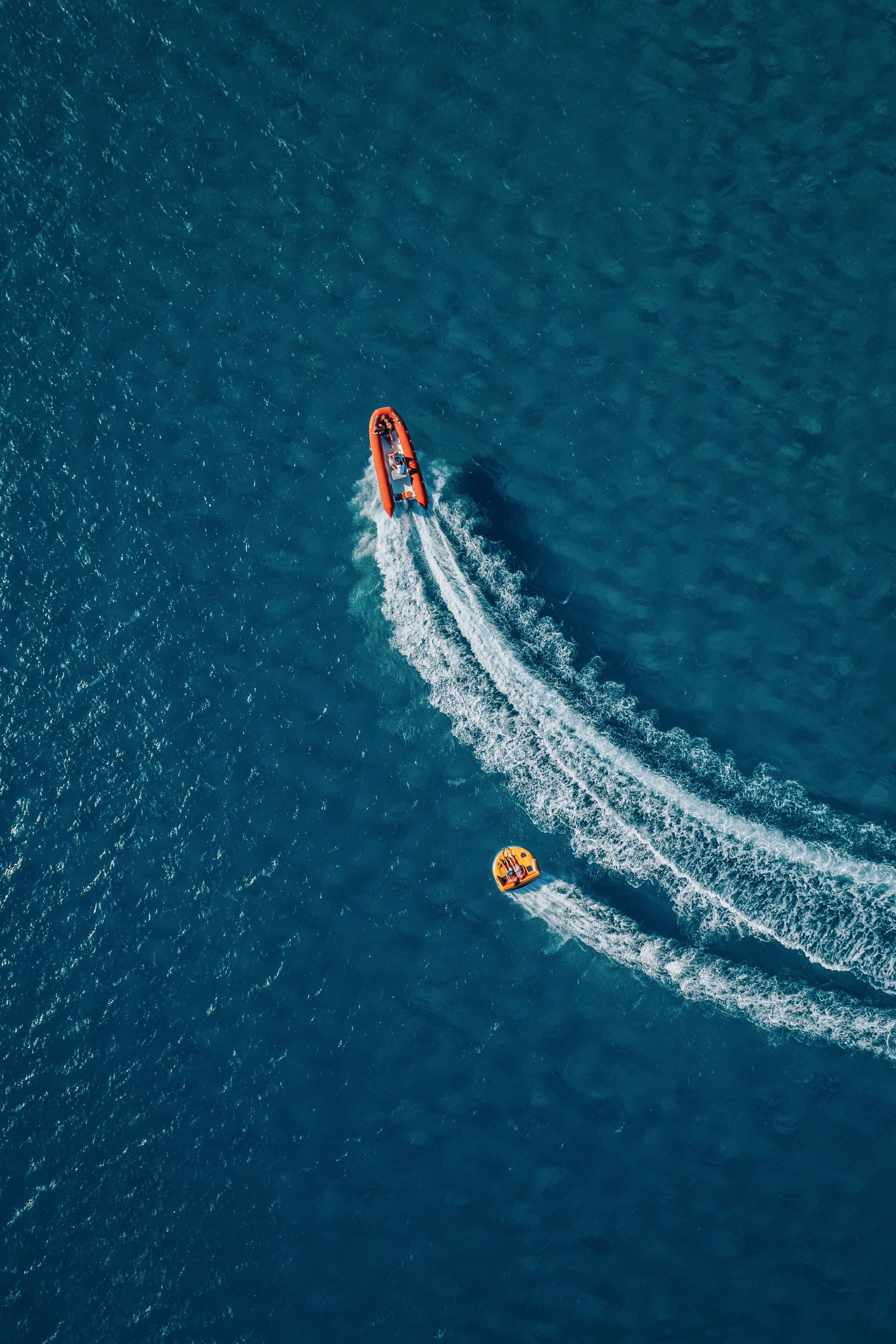 Aerial Shot of a Man in a Motorboat on Sea · Free Stock Photo