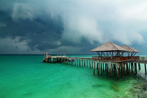 Free stock photo of clouds, pier, sea