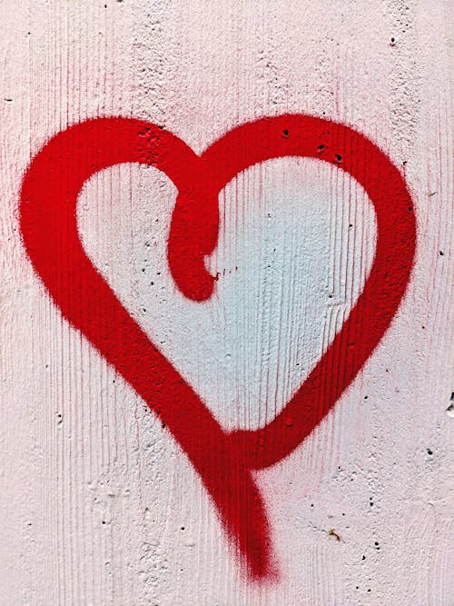 A Heart Shape Painted on a Concrete Wall