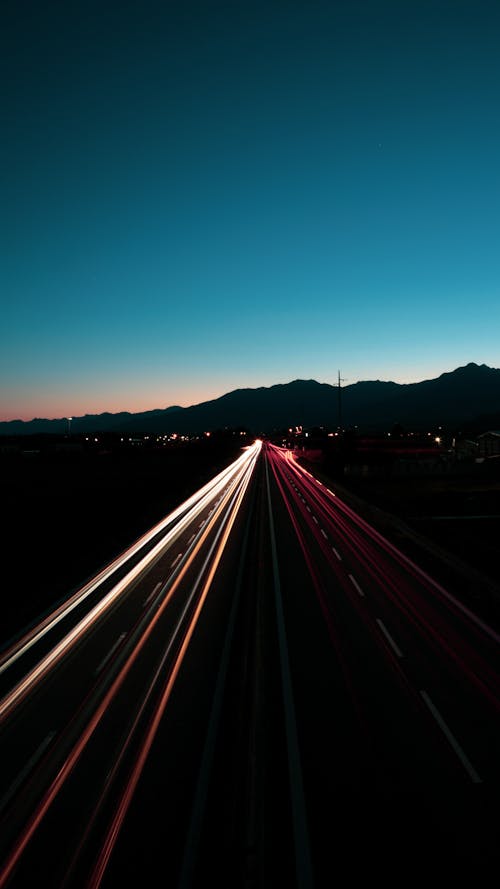 Free Time-Lapse Photography of Cars on the Road during Night Time Stock Photo