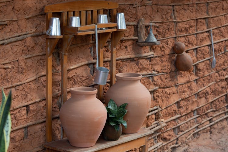 Ceramic Jugs On Bench