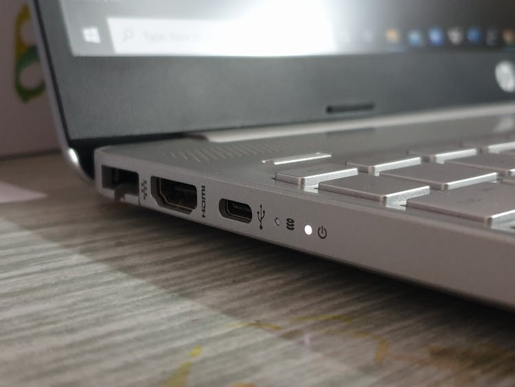 A Close-Up Shot Of The Ports Of A Laptop