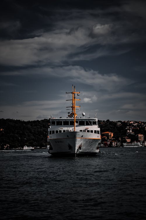 White Ship on the Ocean under the Cloudy Sky