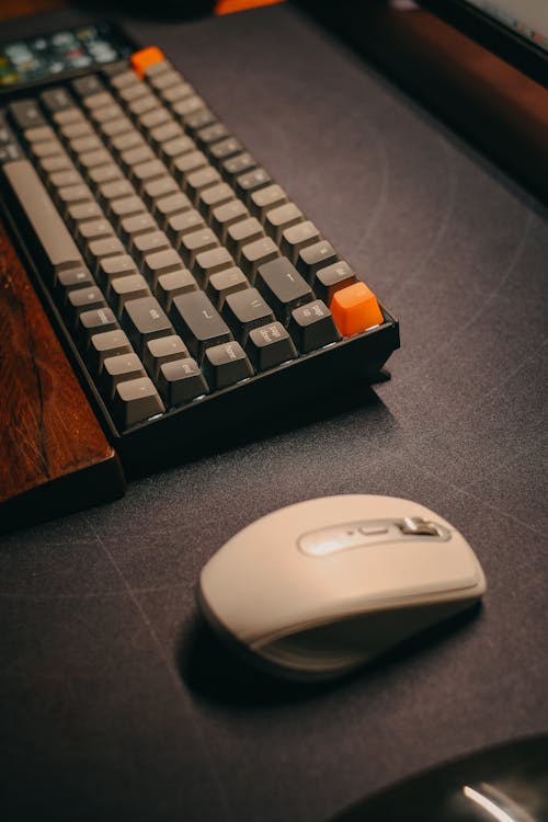 Close-Up Shot of Computer Mouse and Computer Keyboard