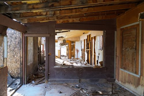Free Explore the derelict and weathered interior of an abandoned house, depicting decay and neglect. Stock Photo