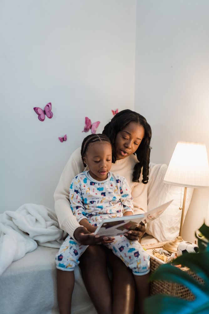 Mother reading a magical bedtime story to her child