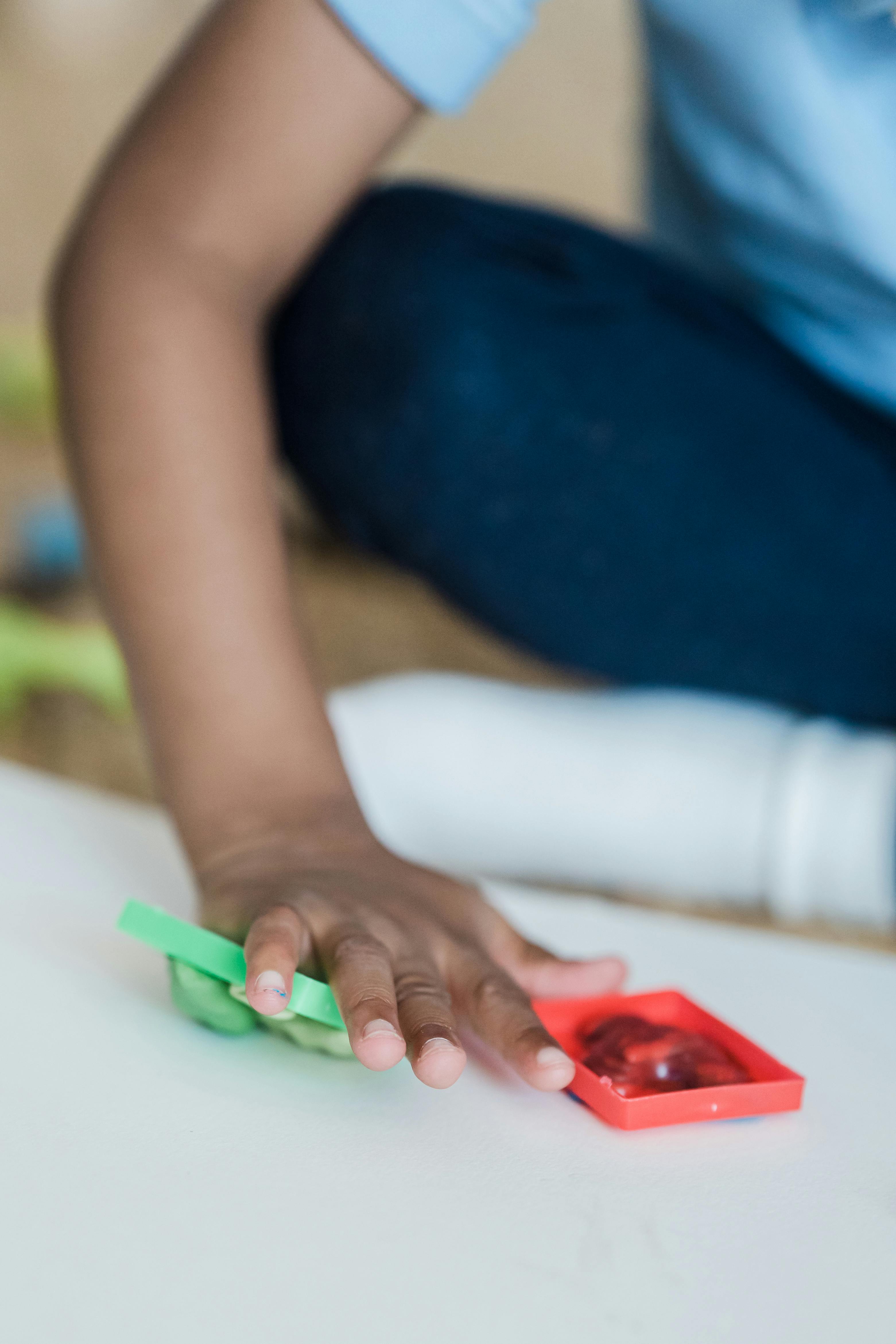 boy playing with plasticine