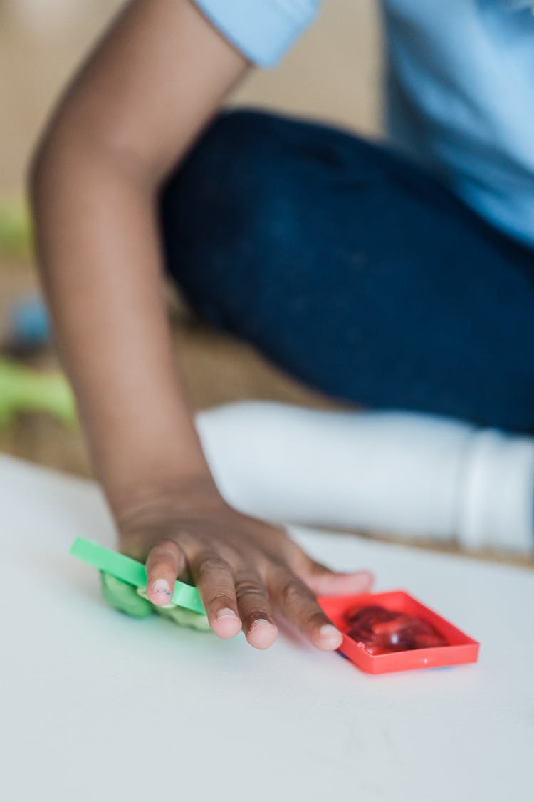 Boy Playing With Plasticine 