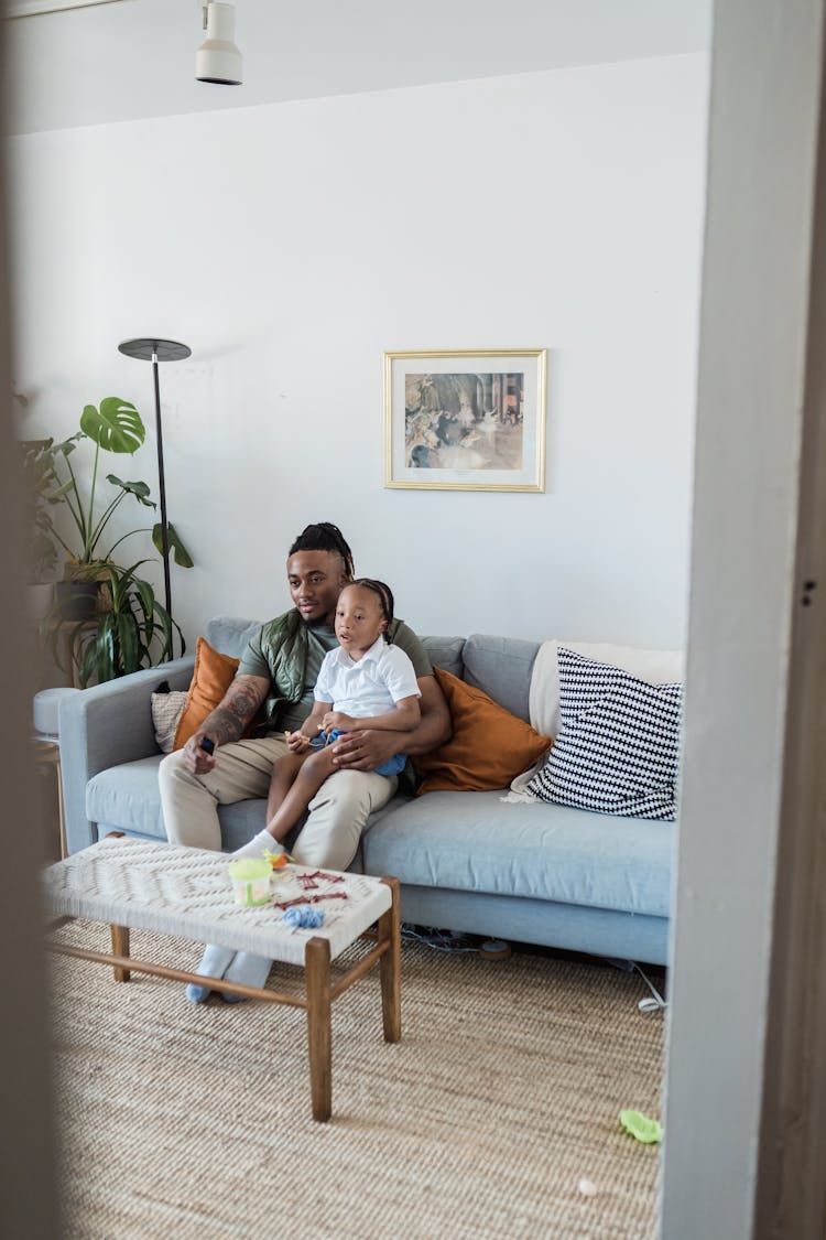 Father And Son Relaxing At Home