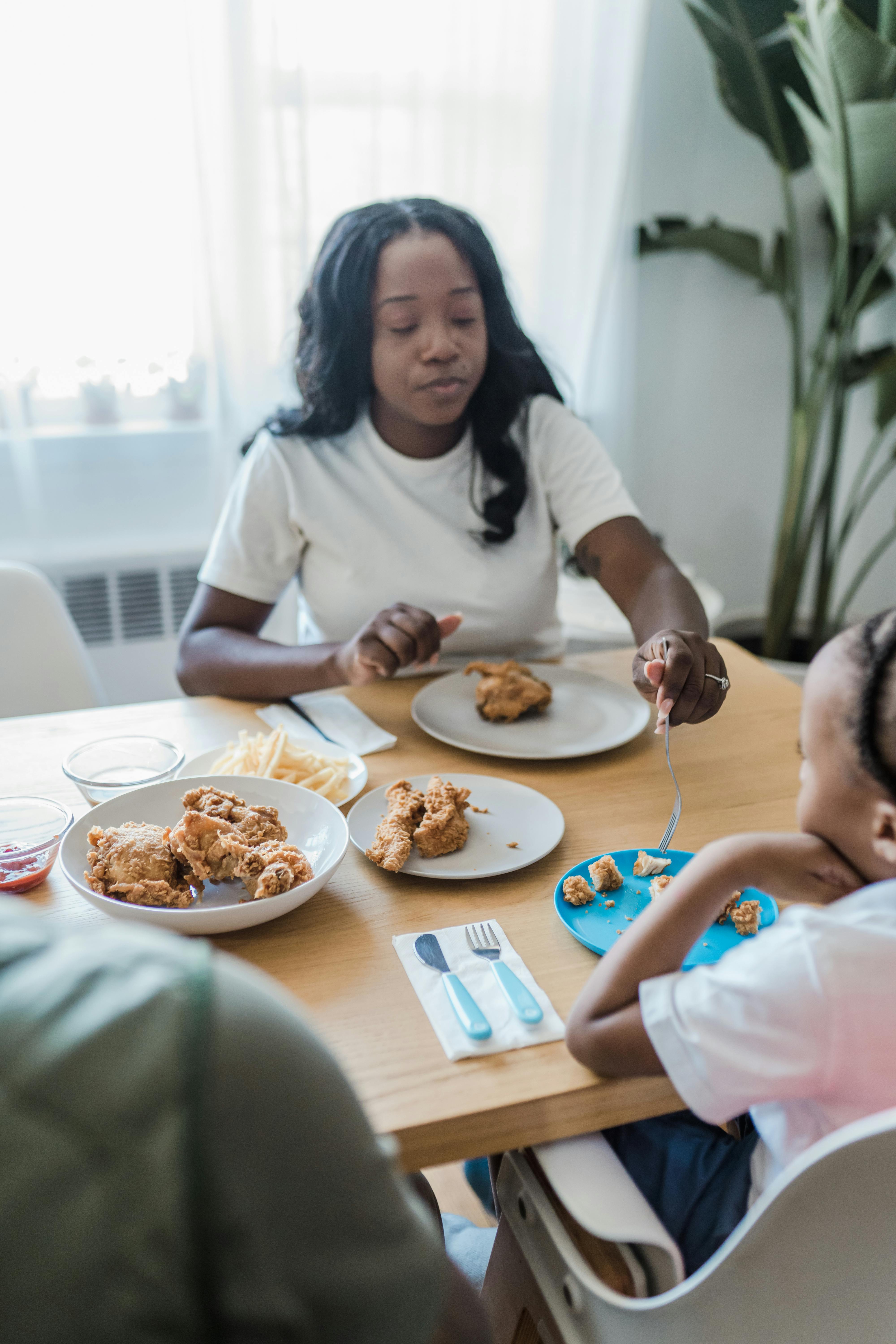 family eating food at table