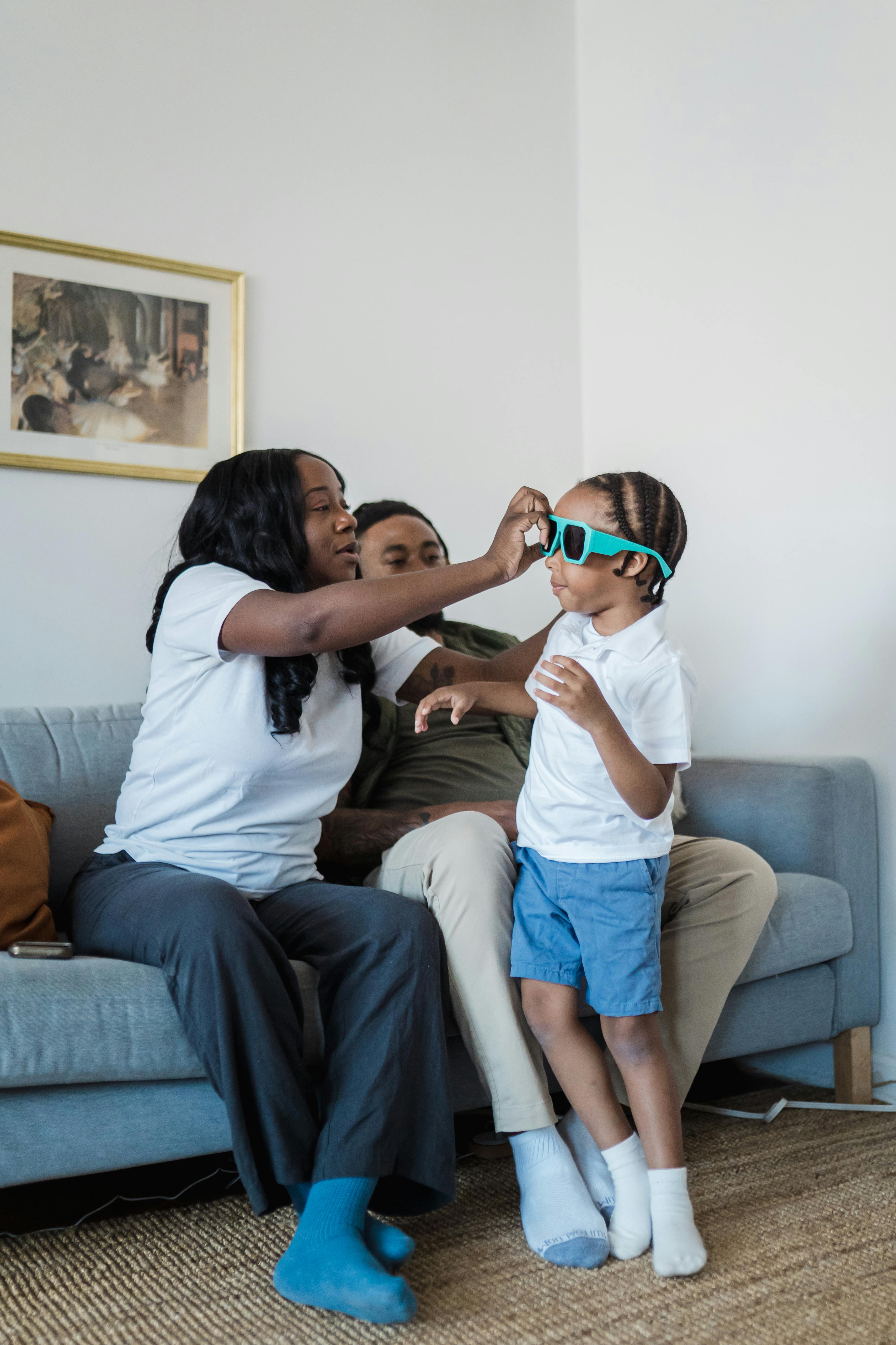 happy family with child playing at home