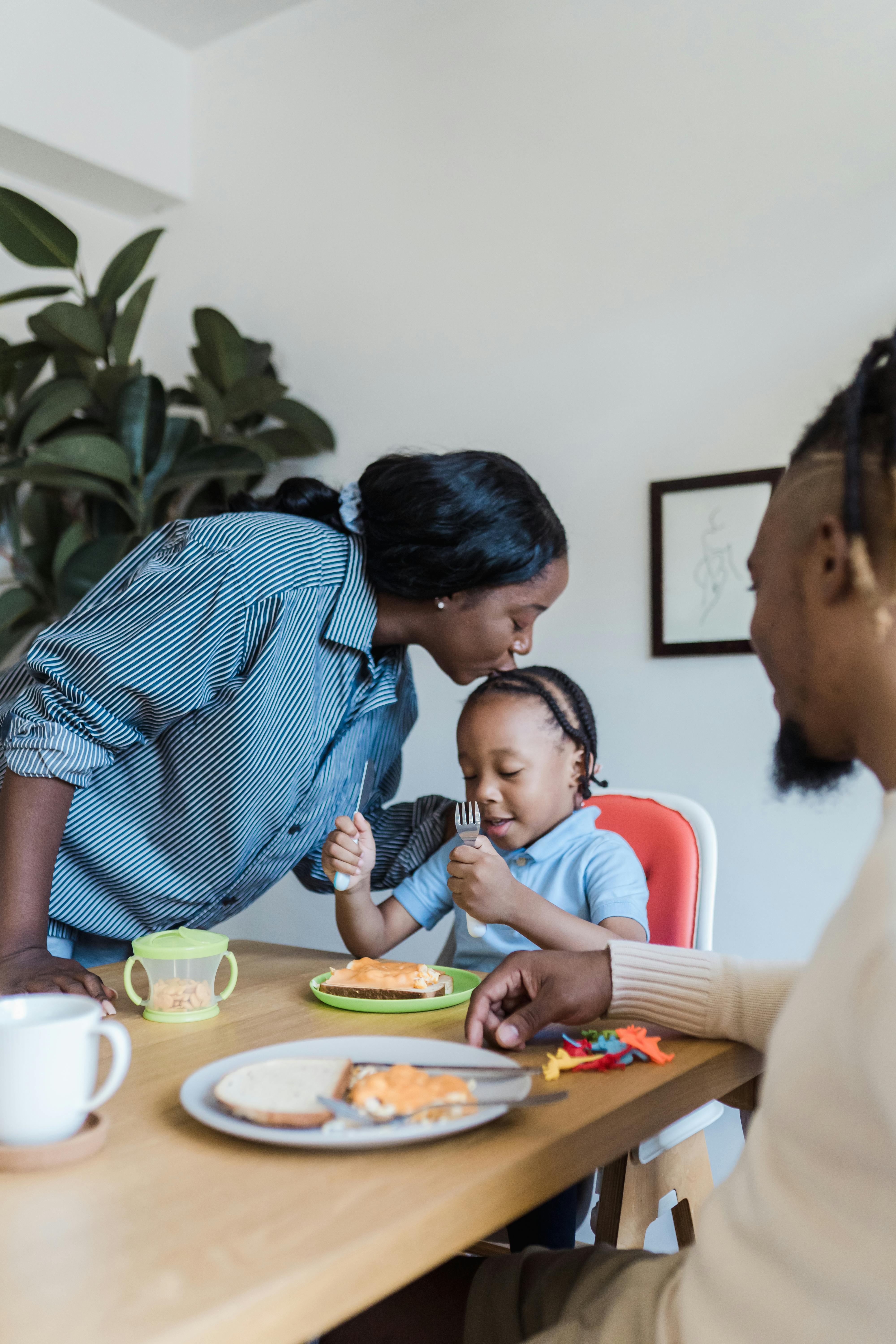 family having breakfast in the kitchen