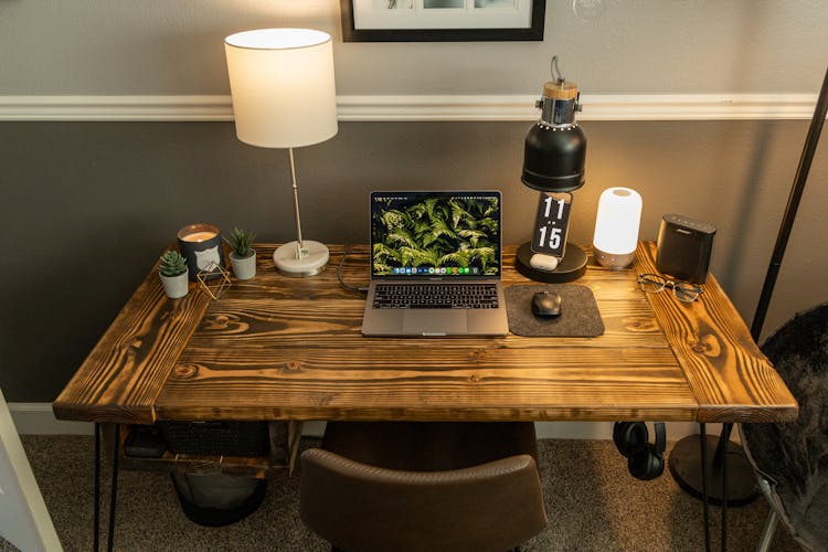 Desk Lamps And Laptop On A Neat Desk At Home