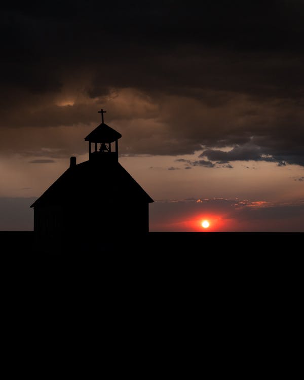 Silhouette of a Church at Sunset