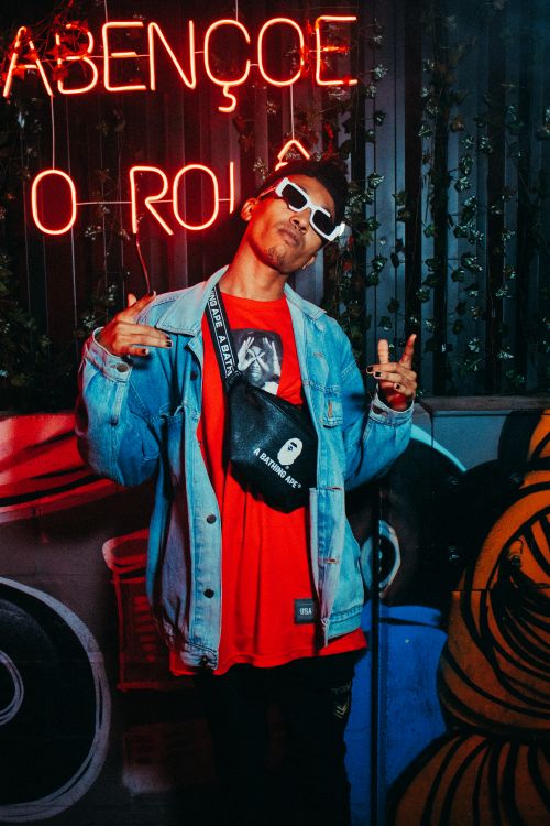 Free Trendy urban portrait in Brazil with neon lights and denim fashion. Stock Photo
