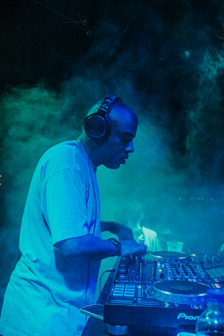 A DJ Performing On The Stage