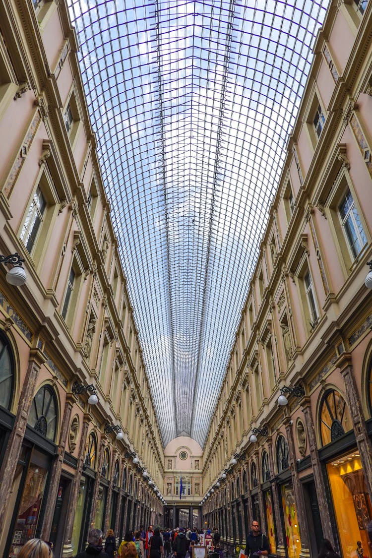 Busy People Walking On A Shopping Mall