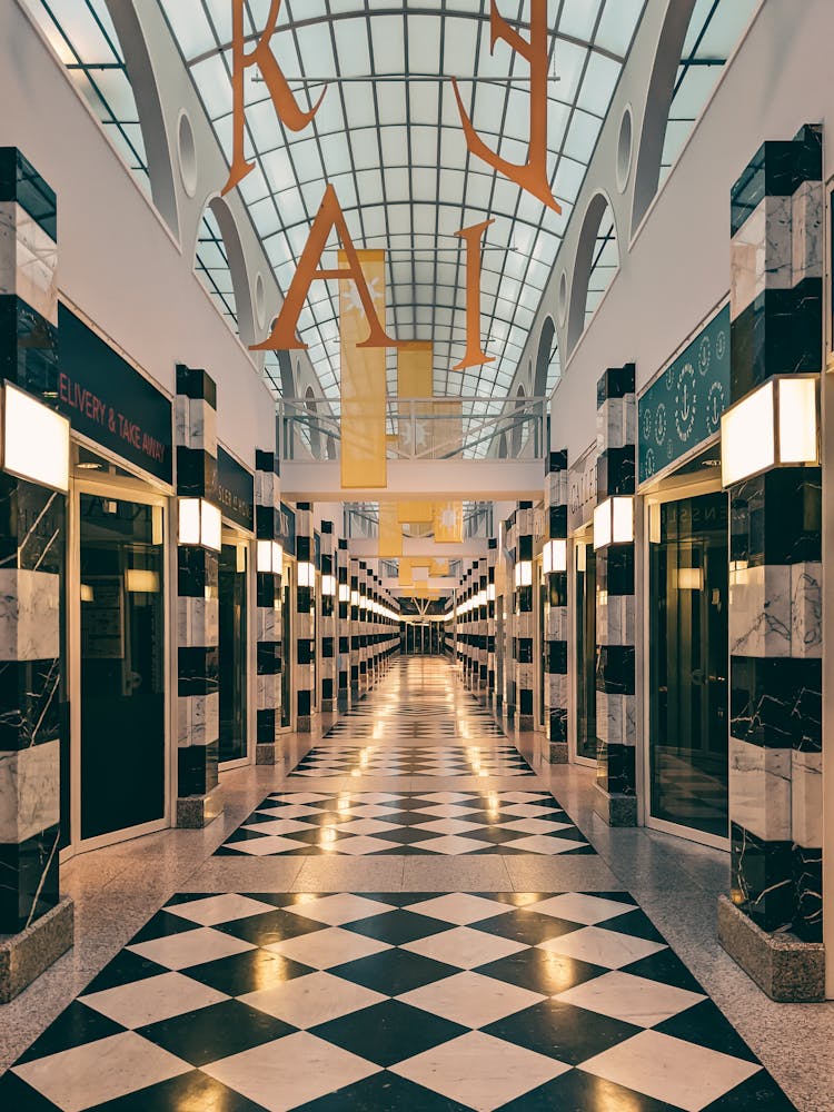 An Empty Hallway Of A Shopping Mall