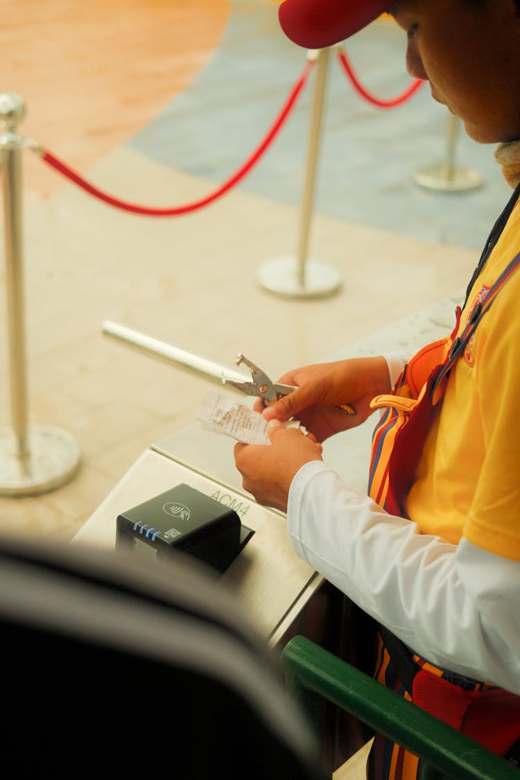 A Worker Checking Tickets