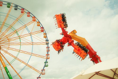 Amusement Rides Under White Sky