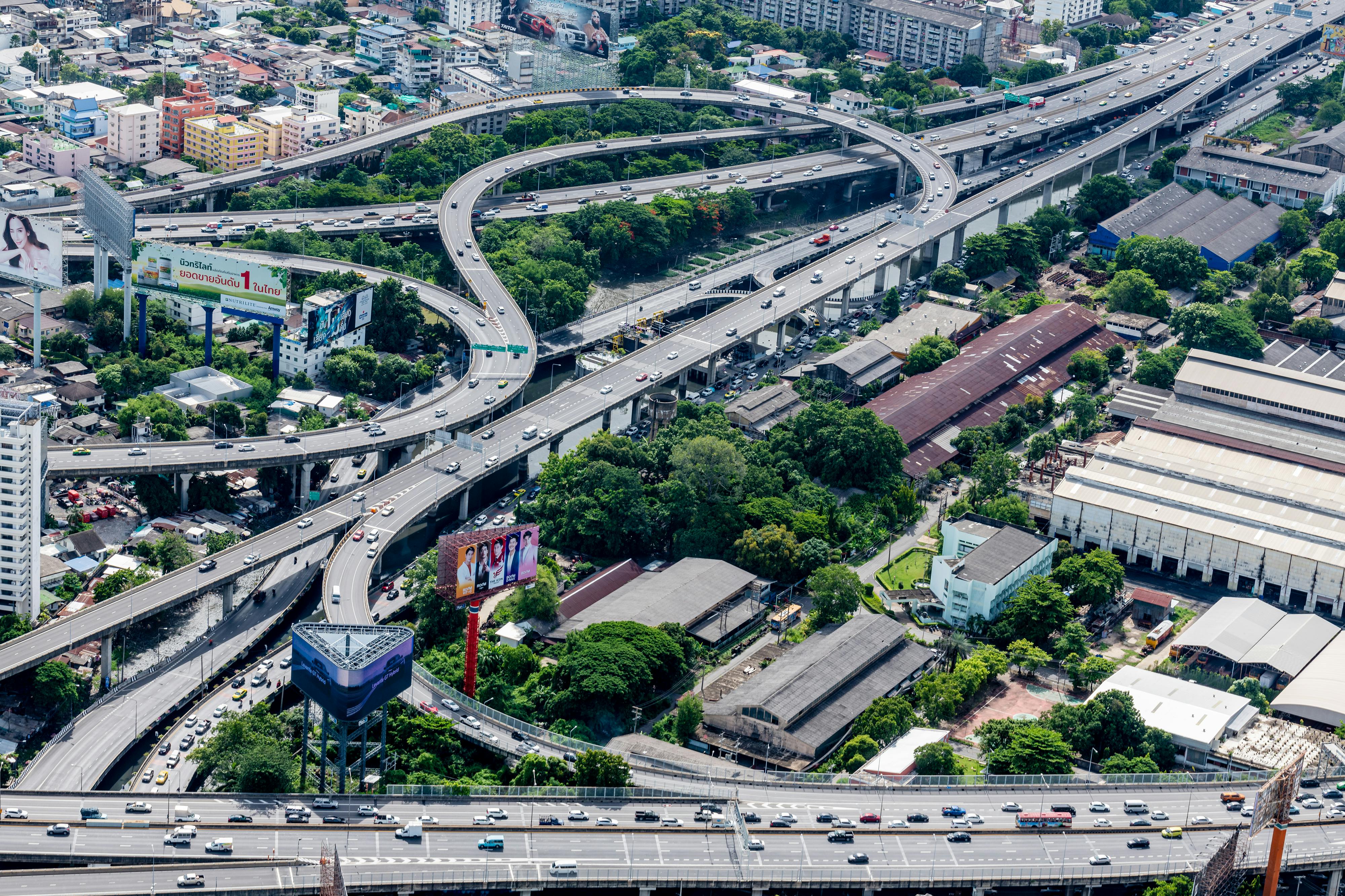 Aerial view of a complex multi-lane highway interchange in Nashville during rush hour, depicting heavy traffic - nashville car accident lawyer