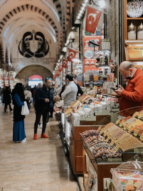 Gratis lagerfoto af basar, butikker, folk