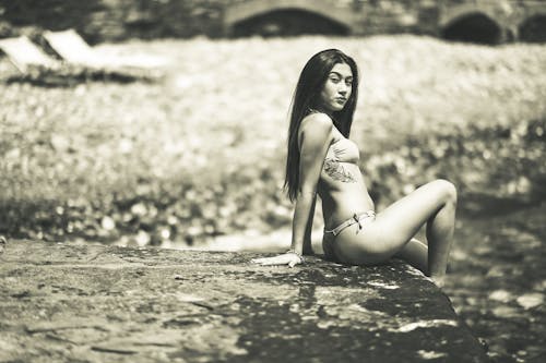 Grayscale Photo of a Sexy Woman in Bikini