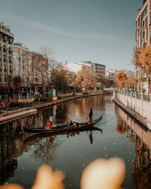 People Riding on Boat on River