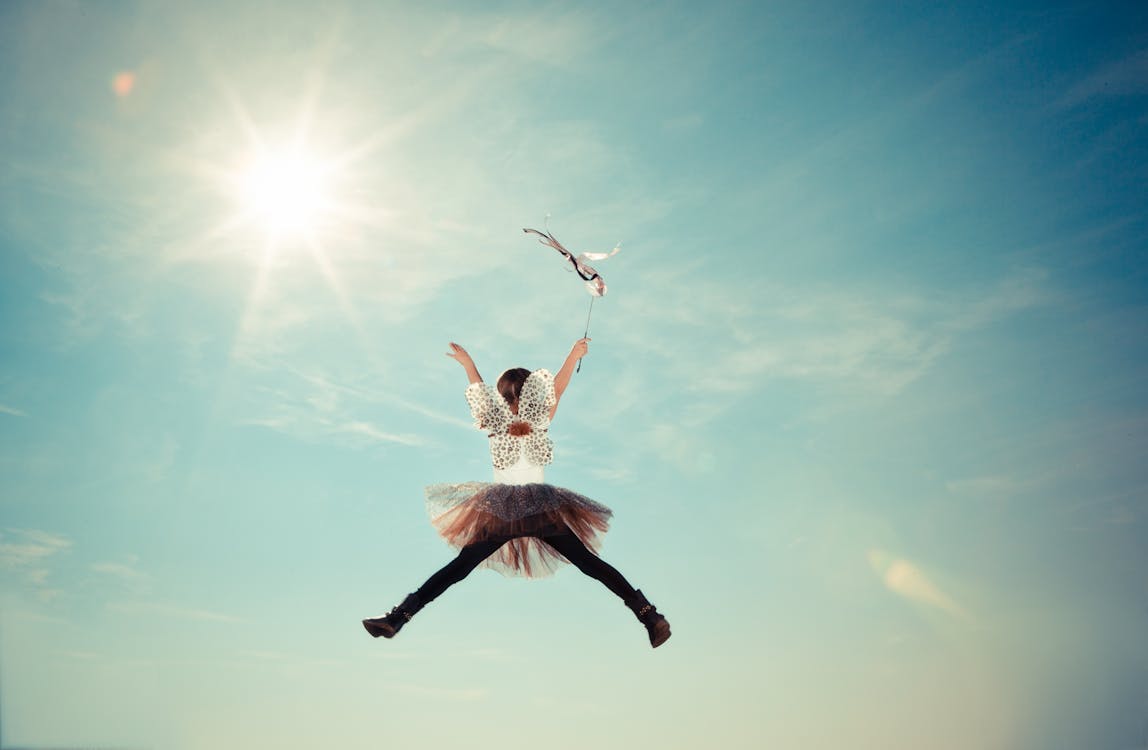 Free Person Jumping Photo Stock Photo