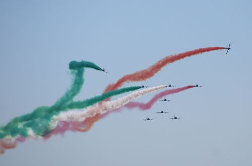 Free The Frecce Tricolori perform a stunning aerial display with colorful smoke trails. Stock Photo