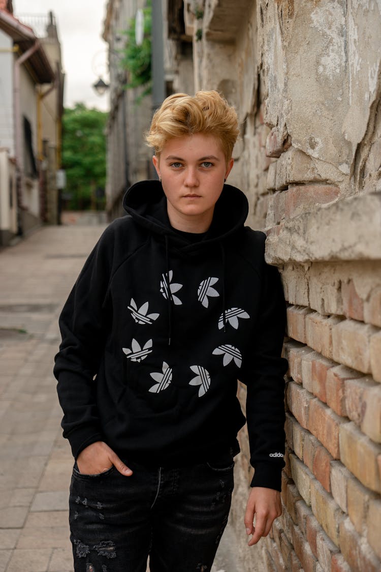 Blonde Boy In Black Sweatshirt