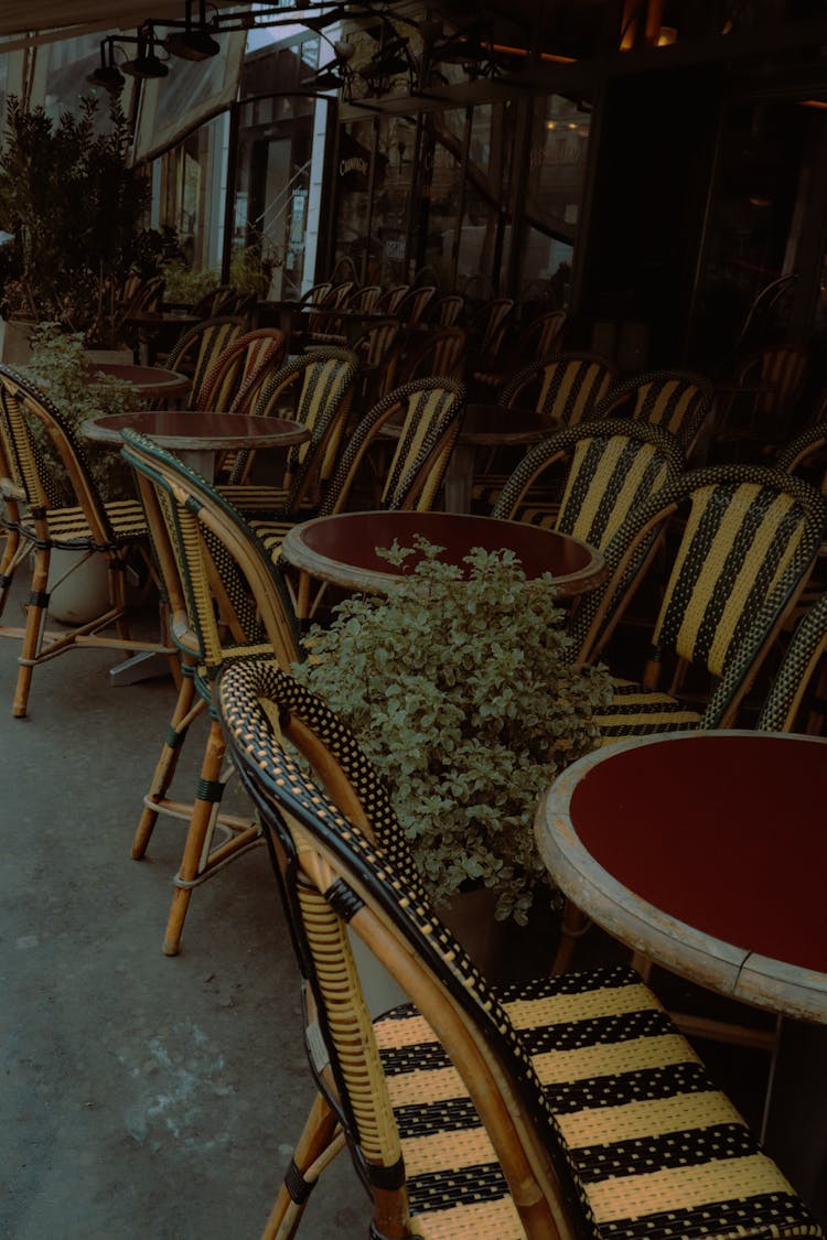 Brown Wooden Chair Beside Red Round Table