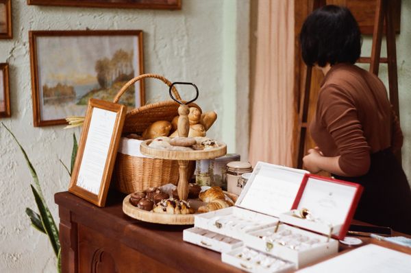 Cafe interior with pastry counter — photo by Vinh Lâm on Pexels