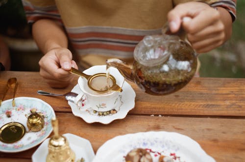 Free Pouring Coffee into Cup Stock Photo