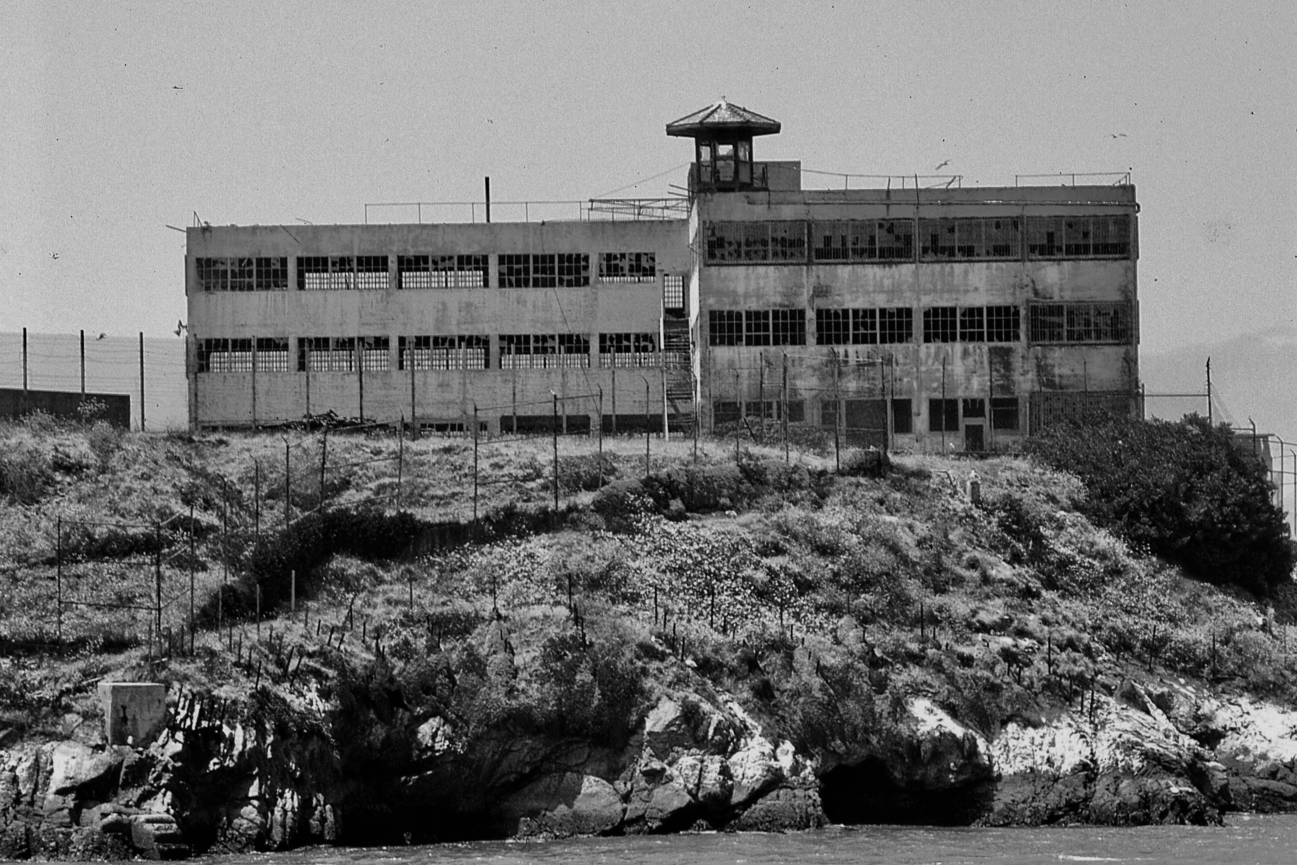 black and white photo of an abandoned building on alcatraz island san francisco usa