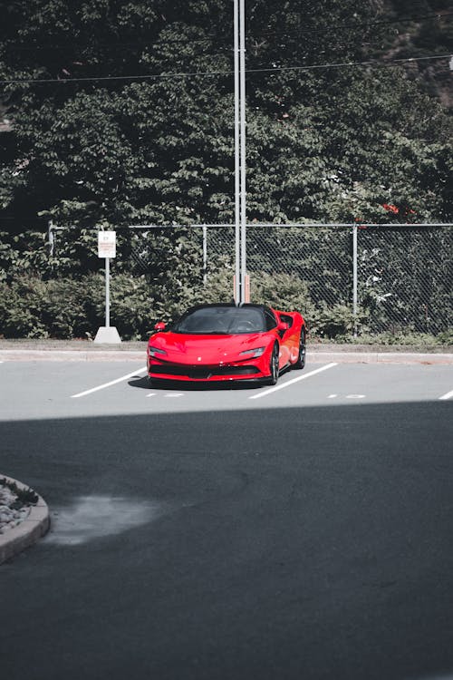 Red Sports Car on Parking Area